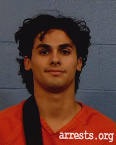 Greg-Wesley Flores  Arrest Photo